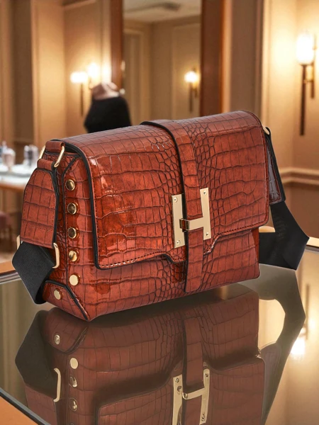 Royalfashion Lackierte kleine Damenhandtasche aus Kunstleder Velia Crest