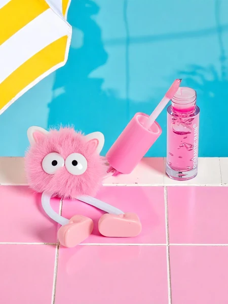 Lipgloss für Kinder mit einem flauschigen Monster Dunkelpink