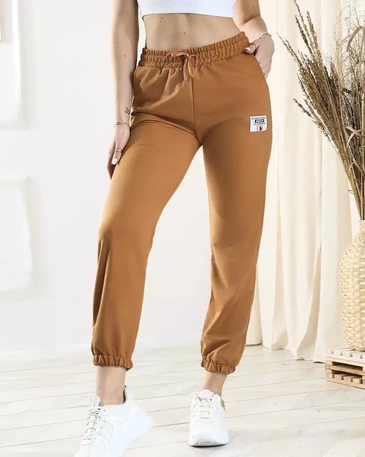 Жіночі коричневі спортивні штани - Одяг